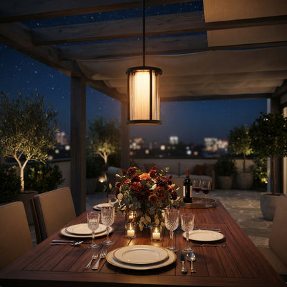 Cylinder Pendant Light - Black and Clear Weather Sealed Outdoor Pendant Casting a Warm Even Glow over Courtyard and Patio Gatherings